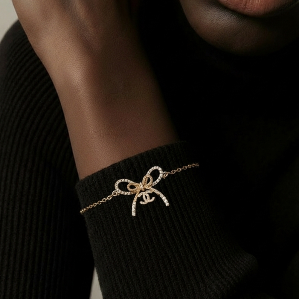 Elegant Gold and Silver Bow Bracelet
